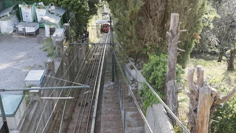 Funicular uphill through the trees Stock Footage 109328694