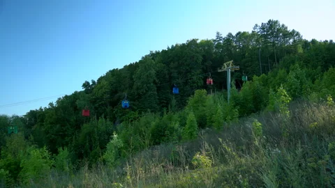 Funiculars descend on a cable Stock Footage 158446455