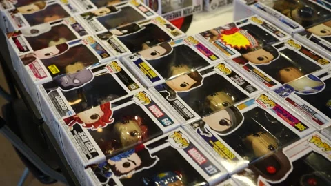 Funko Pops on a Table - Plastic Pop Culture Statues Video stock 234377894