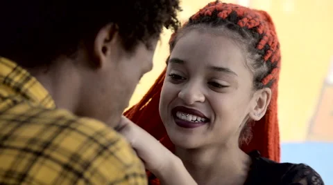 Funky couple cuddling Stock Footage 61292318