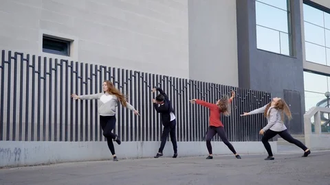 Funky group of contemporary dancers doing a street show together. Stock Footage
