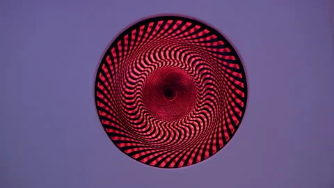 Funky red light spinning in a hypnotic pattern on the wall of a bar with soft in Stock Footage 199460683