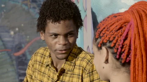 A funky young couple talking to each other near wall Video stock 61292307