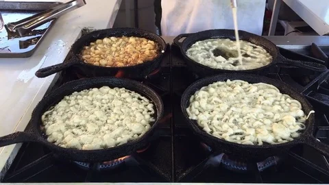 Funnel cakes cooking Stock Footage 73778147