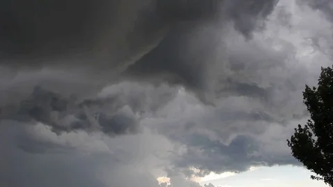 Funnel clouds forming from a storm bank Stock Footage 78360113