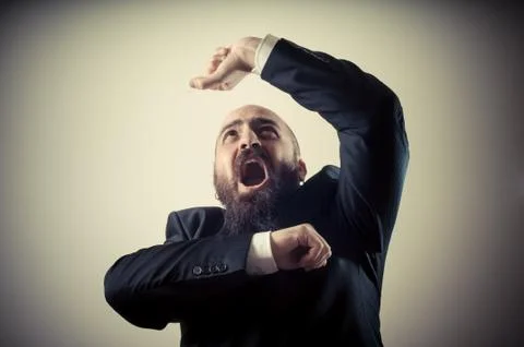 Funny afraid elegant bearded man Stock Photos
