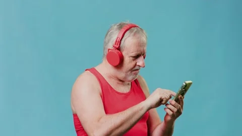 Funny Aged Man with Mobile Application, Listening Stock Footage 234690448