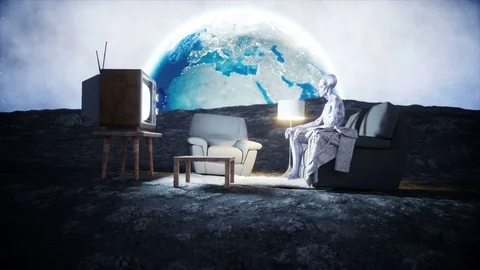 Funny alien watching TV on the sofa on the moon. Living on the moon concept. Stock Footage 81794947