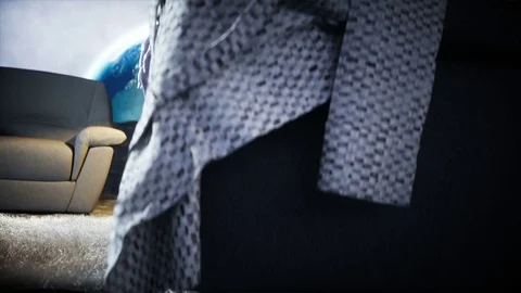 Funny alien watching TV on the sofa on the moon. Living on the moon concept. Stock Footage 81797649