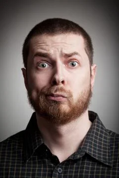 Funny amazed guy Stock Photos