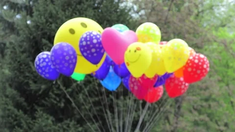 Funny balloons swaying in the wind Stock Footage 107031130