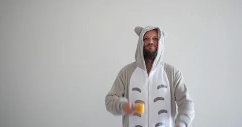 Funny bearded handsome man playing the maracas a percussion instrument Video stock 116527493