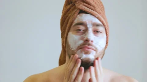 Funny bearded man, with a white mask on his face Stock Footage 166165053