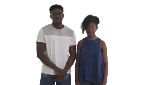 Funny black couple mocking and making faces looking at camera. sticking out Stock Footage 135606328