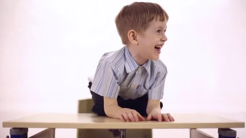 Funny boy looks around and laughs Stock Footage 72269162