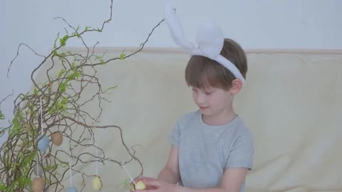 Funny boy in rabbit ears on his head. Easter child Stock Footage 149755835