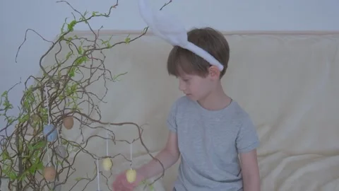 Funny boy in rabbit ears on his head. Easter child Stock Footage 149755839