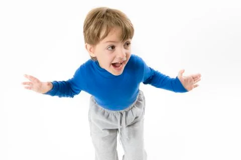 Funny boy shouting with open arms isolated on white Stock Photos