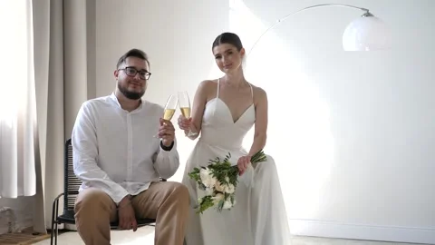 Funny Bride and Groom posing for photographer. Wedding photo shoot. Stock Footage 297637895