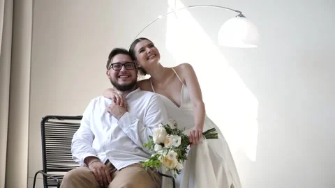 Funny Bride and Groom posing for photographer. Wedding photo shoot. Stock Footage 297637965