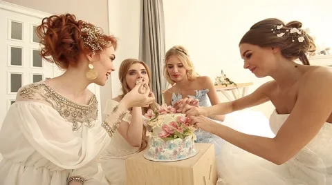 Funny bride eating cake. Stock Footage 64159668