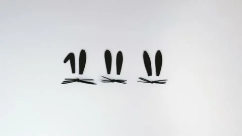 Funny bunny ears moving on the white baclground, happy easter concept. Stock Footage 172416128