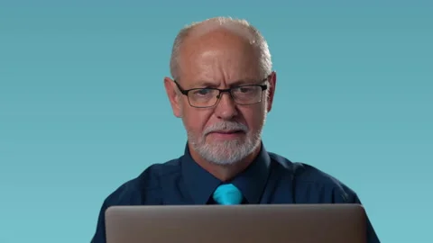 Funny businessman at computer feels rage and anger furious at his computer and Video stock 138400578