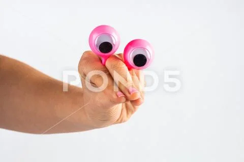 Funny character creature looking down with pity and regret, depicted with fem Stock Photos