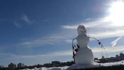 Funny cheefful snowman background blue sky Stock Footage 72520566