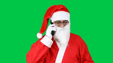 Funny, cheerful and smiling Santa Claus talking on cell phone. Stock Footage 166319420