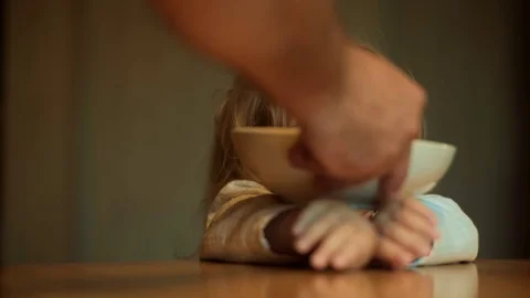 Funny child food playing in kitchen. Child does not want to eat. Baby food Stock Footage 79616963