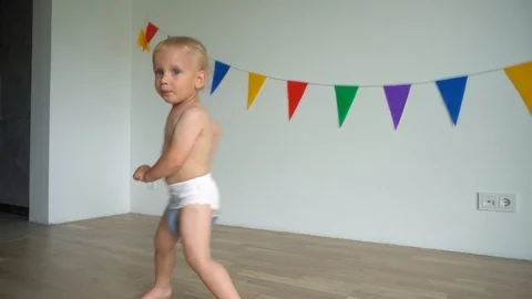 Funny child running. Active happy toddler boy move actively. Gimbal movement Stock Footage 115661268