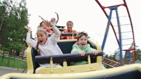 Funny Children Riding Roller Coaster