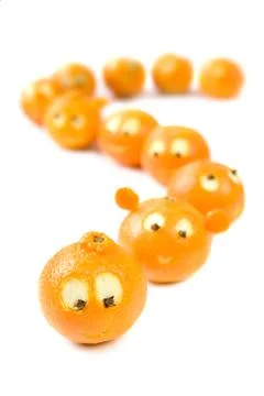 Funny clementines in queue Stock Photos