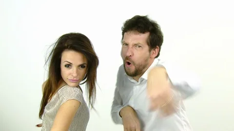 Funny couple dancing making cute faces slow motion looking camera Stock Footage 99794918