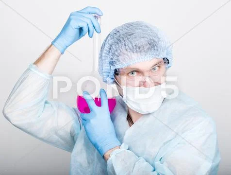 Funny crazy emotional chemist with flask. mad scientist in his laboratory Stock Photos