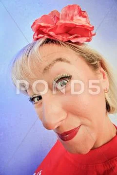 Funny cunning woman portrait on vivid color background Stock Photos