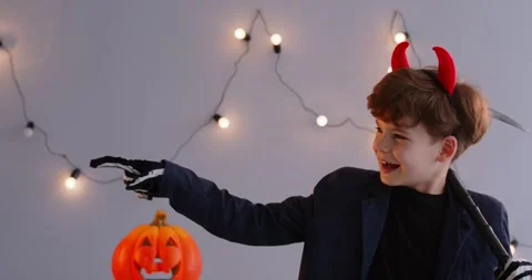 Funny cute little boy wearing perfect black Halloween costume cosplay outfit Stock Footage 314966599