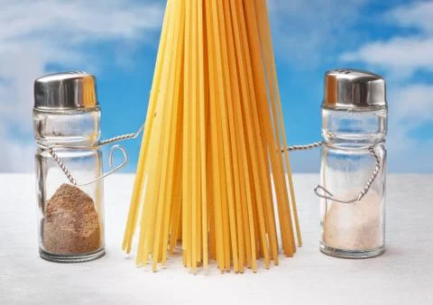 Funny cutlery salt shaker and pepper with pasta Stock Photos