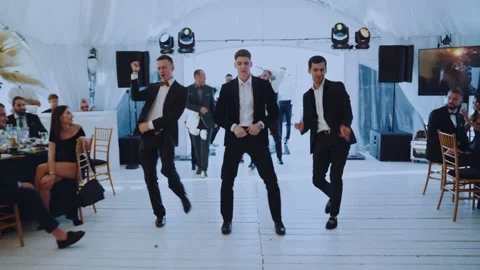Funny dancing men at the celebration Video stock 168083475