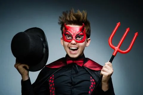 Funny devil against dark background 스톡 사진