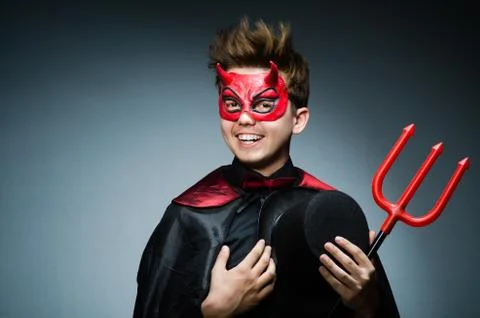 Funny devil against dark background 스톡 사진