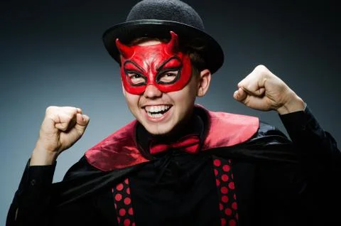 Funny devil against dark background 스톡 사진