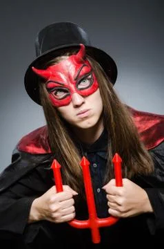 Funny devil in halloween concept Stock Photos