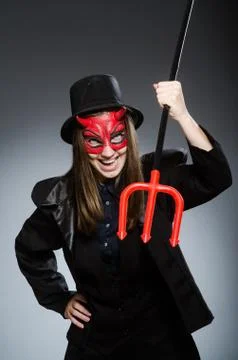 Funny devil in halloween concept Stock Photos