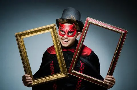 Funny devil with picture frame 写真素材