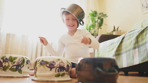 Funny drum part from a little boy. Stock Footage 129372677