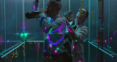 Funny drunk office workers partying in the elevator Stock Footage 302976852
