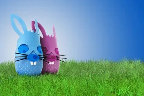 Funny Easter bunny couple on grass Stock Photos