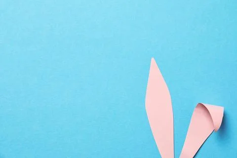Funny Easter bunny ears on color background, top view with space for text 스톡 사진